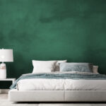 Papier peint Mur vert avec taches noires