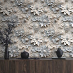 Papier peint Motif floral complexe dans des tons doux.