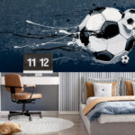 Papier peint Un ballon de football entre en action