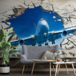 Papier peint Jet éclate à travers le mur fissuré