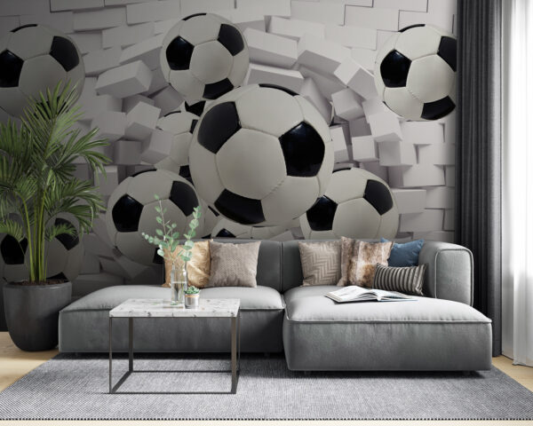 Des ballons de football qui traversent un mur Papier peint Des ballons de football qui traversent un mur