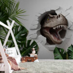 Papier peint Un dinosaure émerge d'un mur fissuré