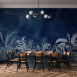Papier peint Feuillage tropical sur fond sombre.