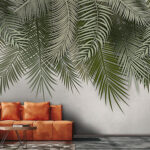 Papier peint Feuilles tropicales sur fond uni.