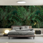 Papier peint Feuilles de jungle luxuriantes avec papillons.
