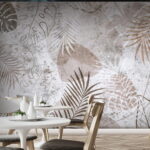 Papier peint Feuilles tropicales dans des tons sourds