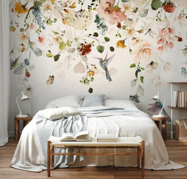 Un colibri plane sous une arche florale Papier peint Un colibri plane sous une arche florale