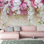Papier peint Orchidées en cascade sur des fleurs roses.