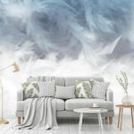 Papier peint Plumes blanches sur une surface