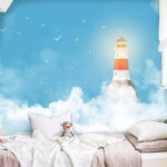 Papier peint Phare dans les nuages