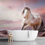 Papier peint Licorne mystique dans un coucher de soleil serein.