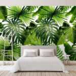 Papier peint Motif de feuilles tropicales vertes et luxuriantes