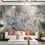 Papier peint Des oiseaux voltigent parmi le feuillage tropical.