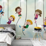 Papier peint Groupe d'enfants grimpant sur des cordes