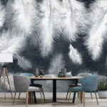 Papier peint Plumes blanches douces sur fond sombre.