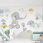 Papier peint Dessin animé d'un éléphant à bicyclette
