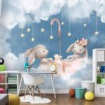 Papier peint Deux lapins dans un parapluie rose