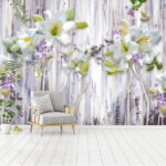 Papier peint Groupe de fleurs blanches sur une surface en bois