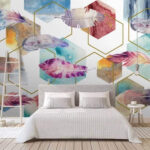Papier peint Plumes et hexagones colorés