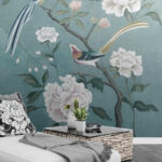 Papier peint Peinture d'oiseaux sur une branche avec des fleurs