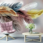 Papier peint Plumes vives dans des tons pastel.