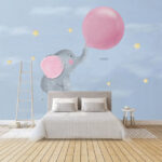 Papier peint Caricature d'un éléphant tenant un ballon