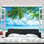 Papier peint Fenêtre avec vue sur la plage et les oiseaux