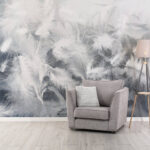 Papier peint Plumes blanches sur une fenêtre