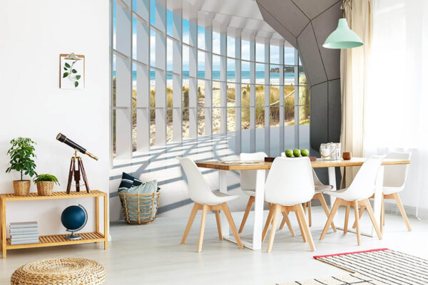 Papier peint Vue sur la plage ensoleillée à travers des fenêtres géométriques