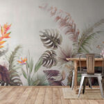 Papier peint Feuilles tropicales et fleurs éclatantes.