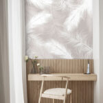 Papier peint Motif délicat de plumes blanches.