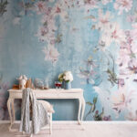Papier peint Des fleurs douces dansent sur le bleu ciel.