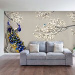 Papier peint Paons majestueux parmi les branches en fleurs.