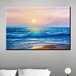 Tableaux Vagues de l'océan au coucher du soleil.