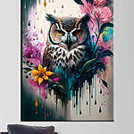Tableaux Hibou vibrant entouré de fleurs vives.