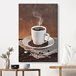 Tableaux Tasse de café sur une assiette avec des grains de café