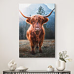 Tableaux Vache montagnarde dans un paysage de montagne pittoresque.