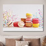 Tableaux Macarons colorés avec des fleurs délicates.