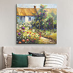 Tableaux Un jardin de cottage fleurit au soleil.