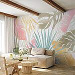 Papier peint Motif de feuilles tropicales colorées.