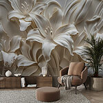 Papier peint Sculpture de fleurs blanches sur un mur