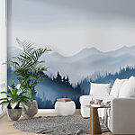 Papier peint Paysage de montagne brumeux avec arbres et montagnes