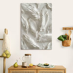 Tableaux Sculpture de plumes blanches sur un mur
