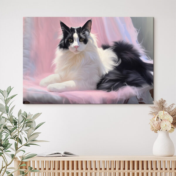 Chat noir et blanc couché sur une couverture rose Tableaux Chat noir et blanc couché sur une couverture rose