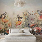 Papier peint Papillons sur des fleurs dans un champ