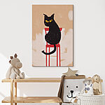 Tableaux Chat noir assis sur une chaise rouge