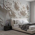 Papier peint Sculpture de fleurs blanches sur un mur
