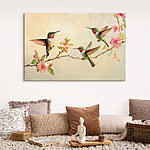 Tableaux Groupe de colibris sur une branche avec des fleurs