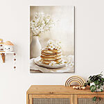Tableaux Pile de crêpes avec des fleurs sur le dessus