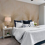 Papier peint Groupe de plumes sur fond beige